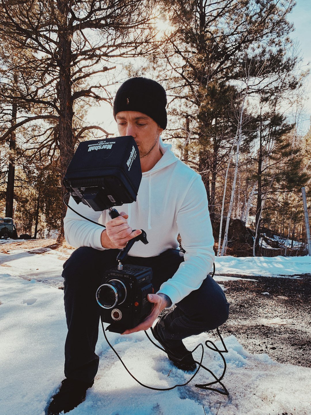 Film crew operating a professional camera on set