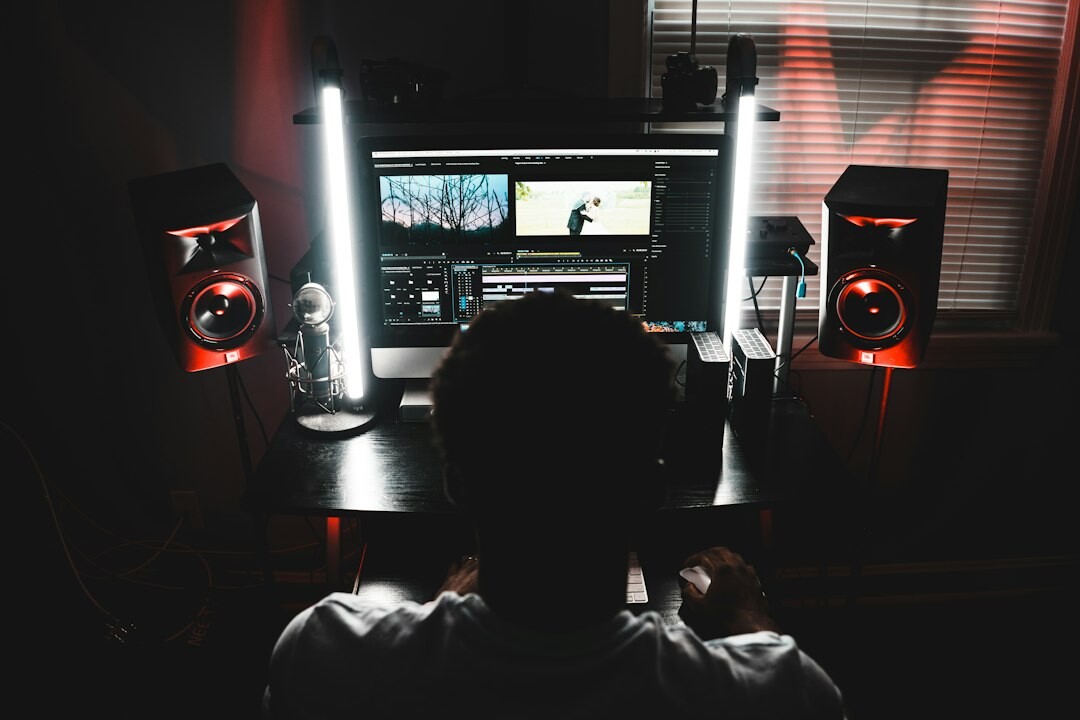 professional filmmaker at desk