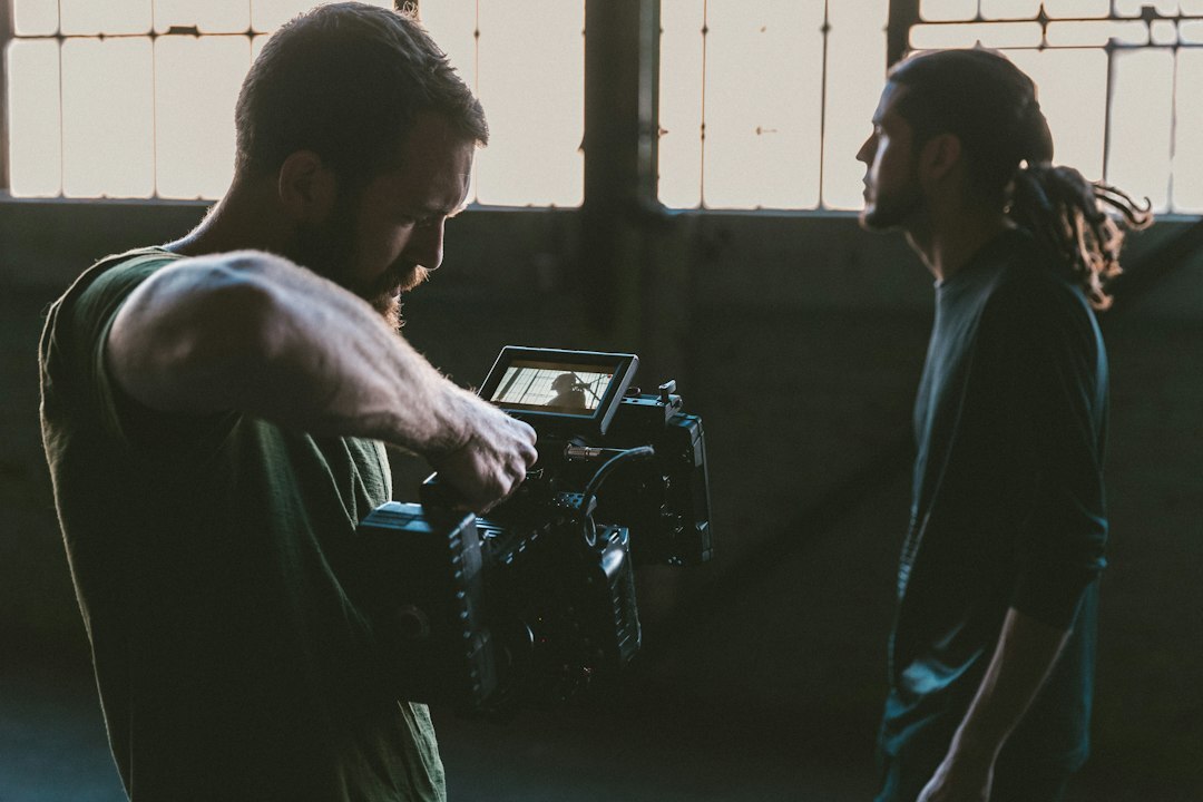 cinematographer adjusting lights